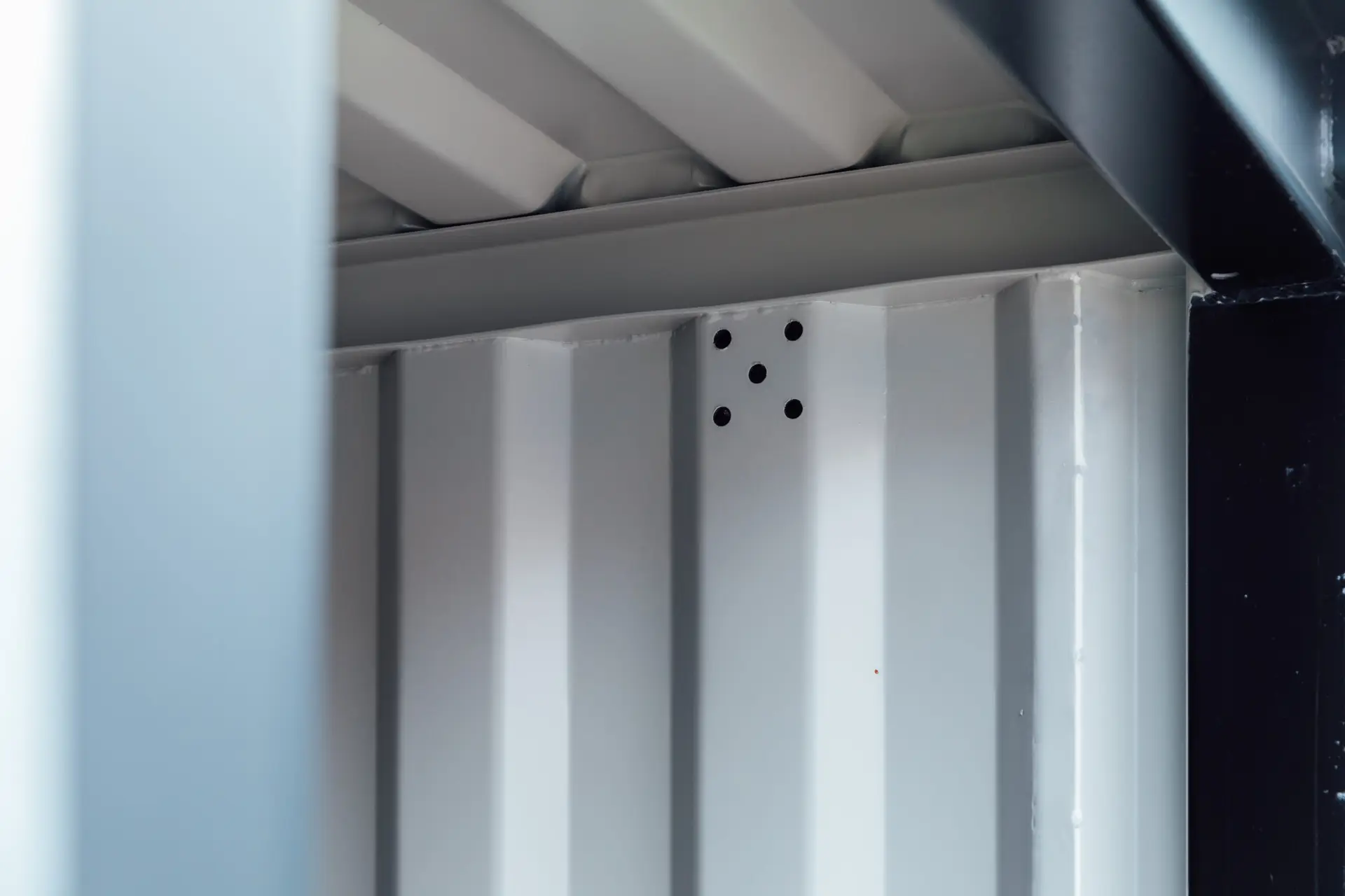 Close-up of an 8ft storage container's ventilation openings.