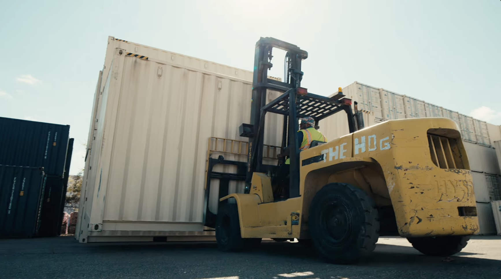 A container is lifted by a forklift at our Monroe, NC yard.